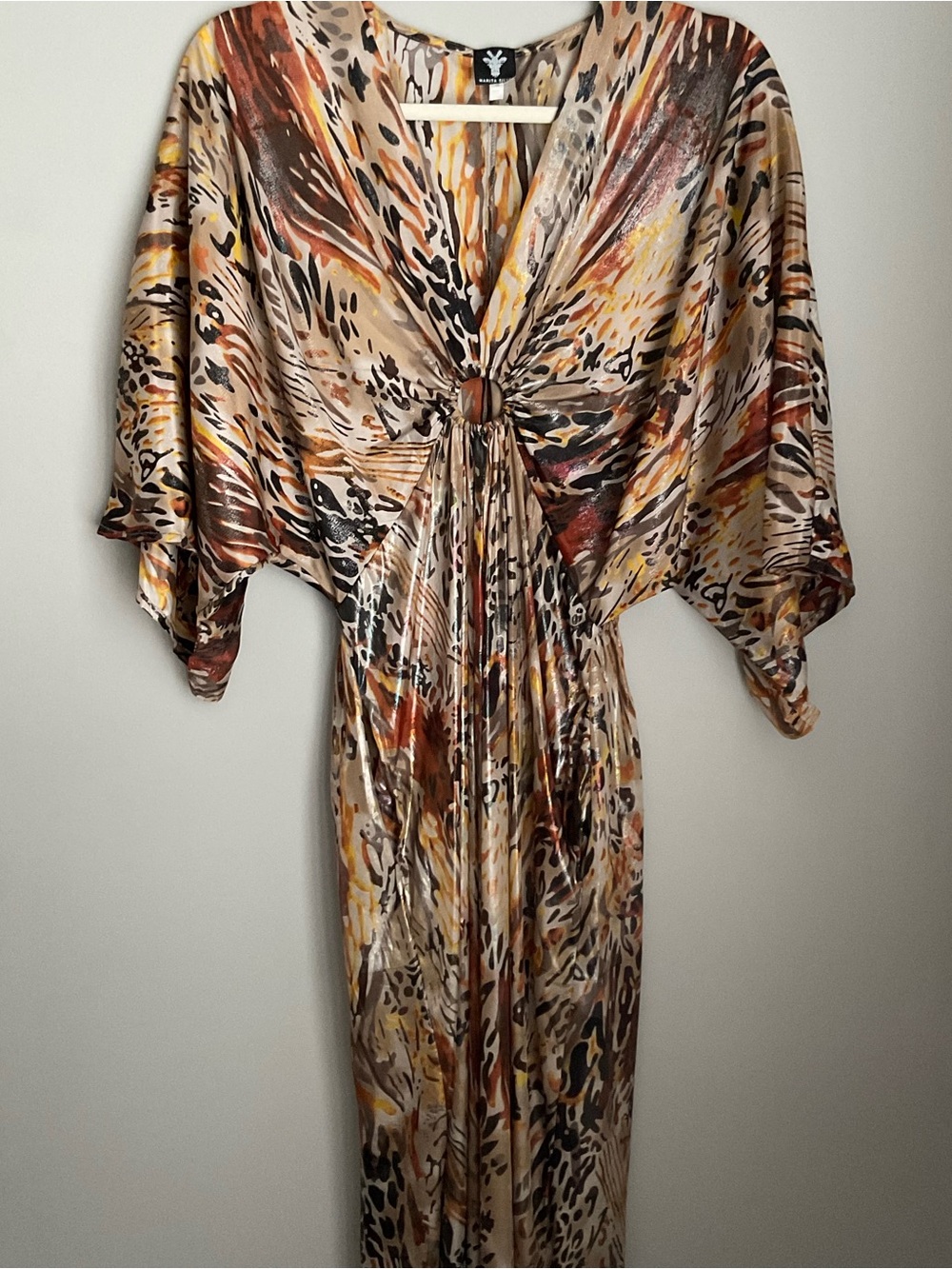 Flowing Animal Print Maxi Dress with Center Ring in size Small.